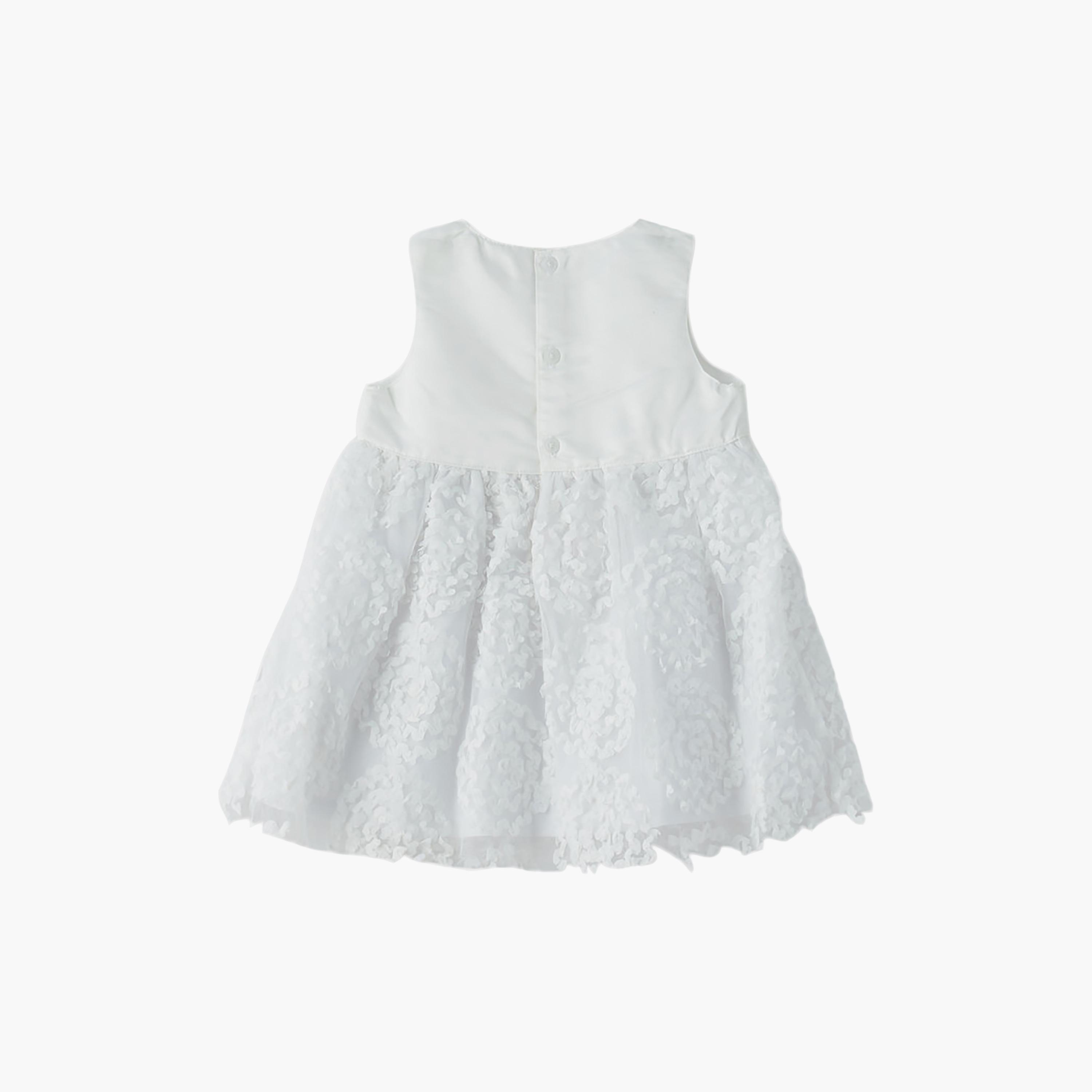 فستان قطن بدون أكمام بقوام بارز بنقشة زهور من يونيكيدز-baby-girls-clothing-dressesandjumpsuits-image-2