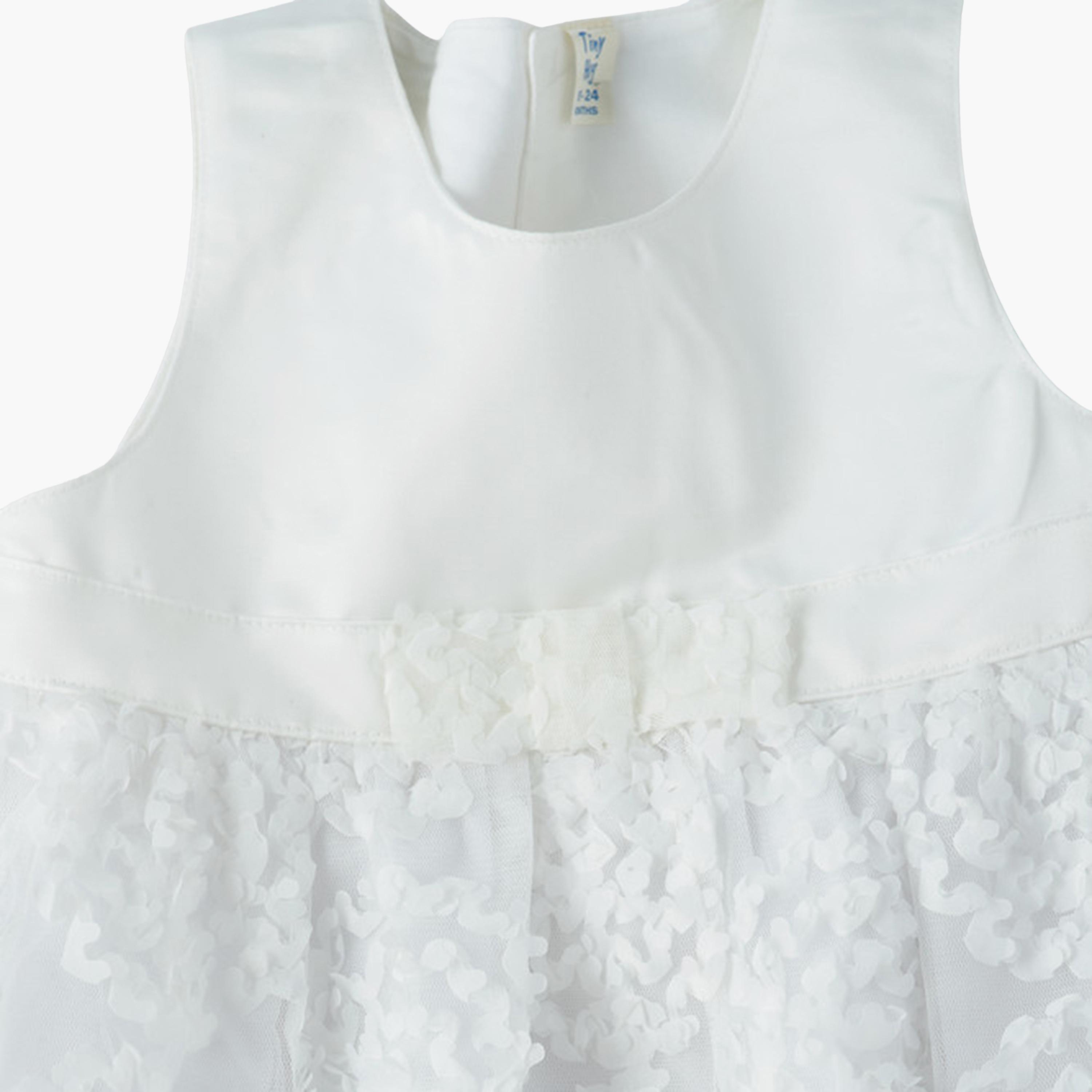 فستان قطن بدون أكمام بقوام بارز بنقشة زهور من يونيكيدز-baby-girls-clothing-dressesandjumpsuits-image-3