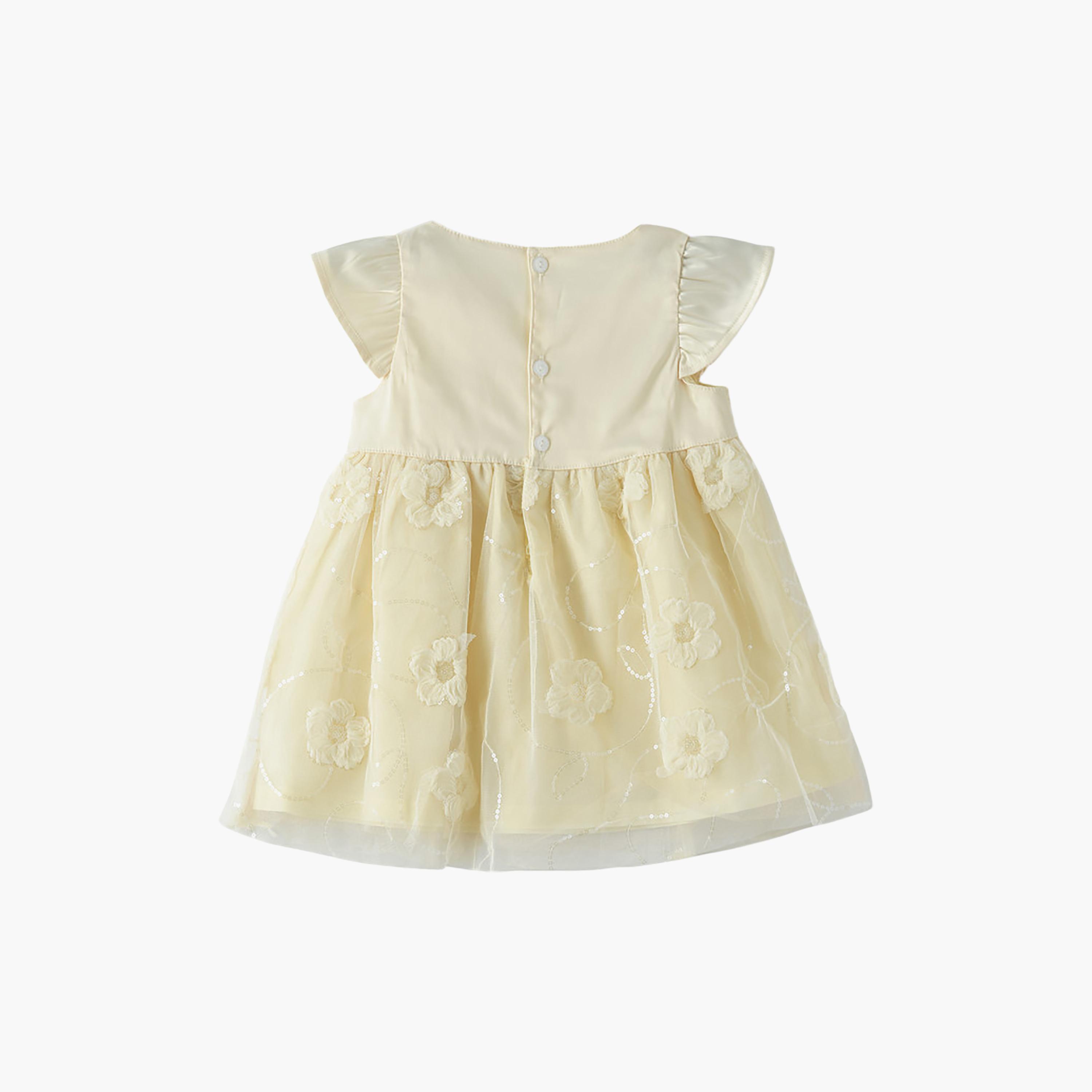 فستان قطن بأكمام قصيرة جداً (كاب) وبقوام بارز بنقشة زهور من يونيكيدز-baby-girls-clothing-dressesandjumpsuits-image-2