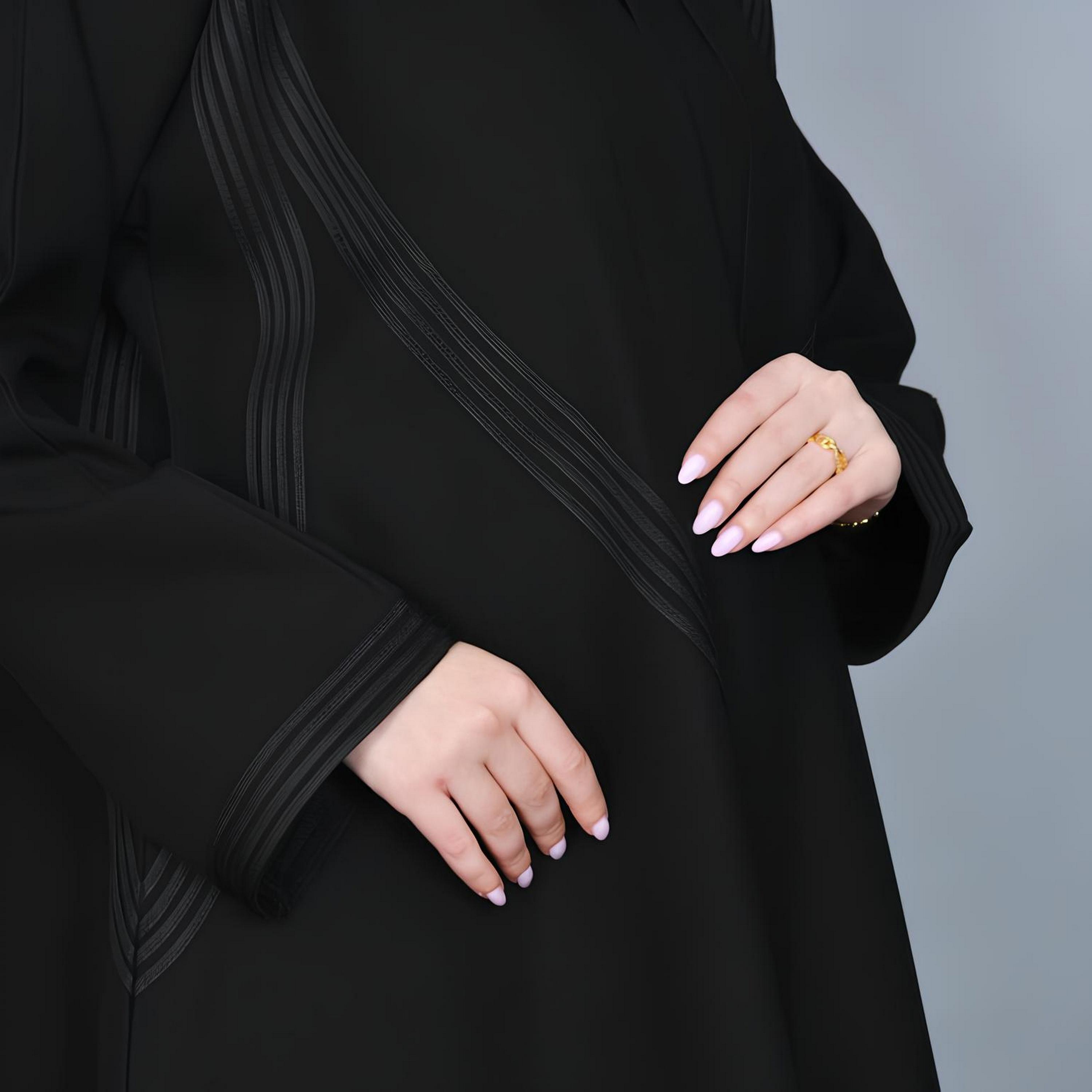 عباية بقصة "هاف كلوش" كتان بتفاصيل "ستيتش لاين" نسائية - أسود من حوراء-women-arabicclothing-abayas-image-4