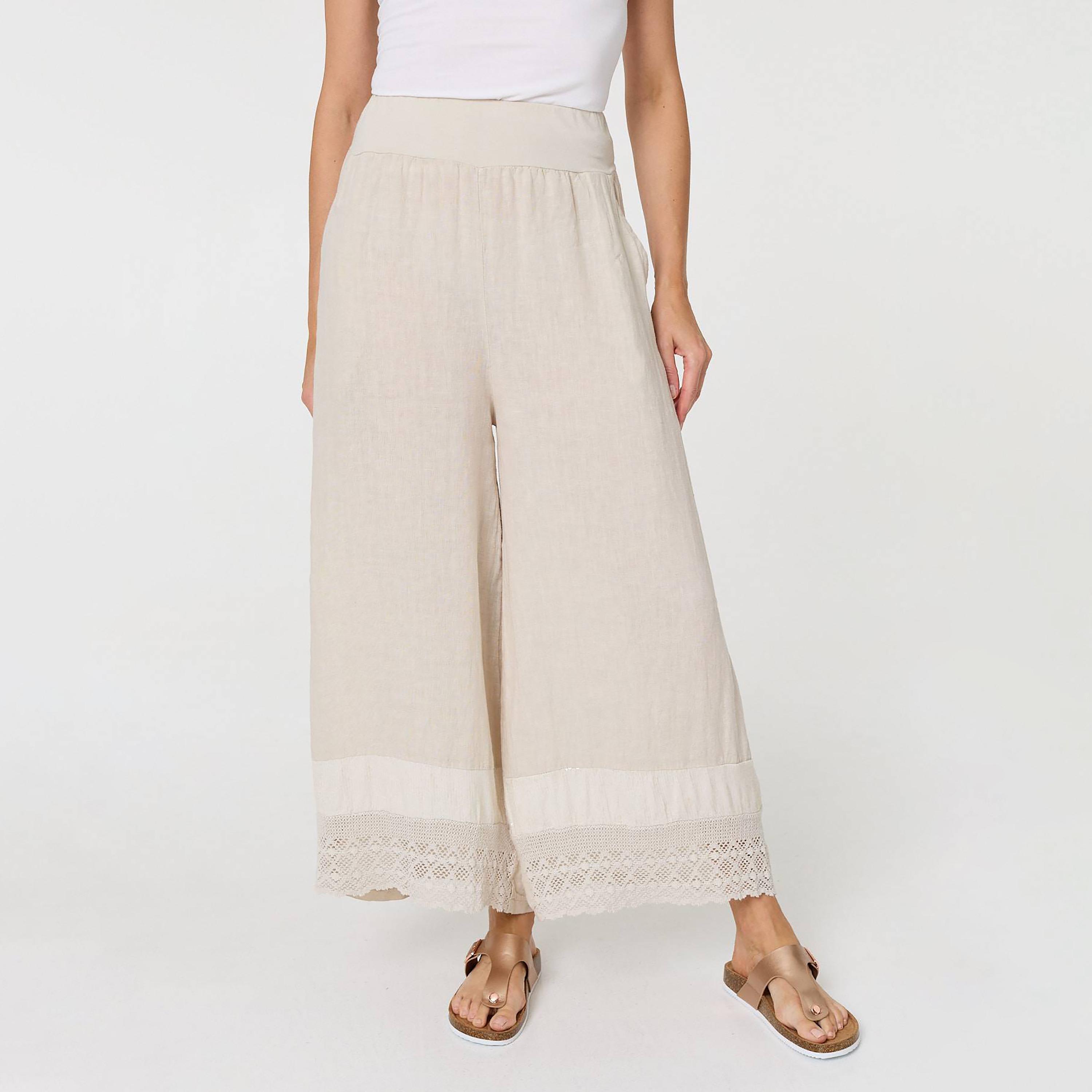 بنطلون كتان نسائي قصة "فلير" واسعة من الأسفل بلون بيج من إيزابيل لندن-women-clothing-bottoms-trousers-image-1