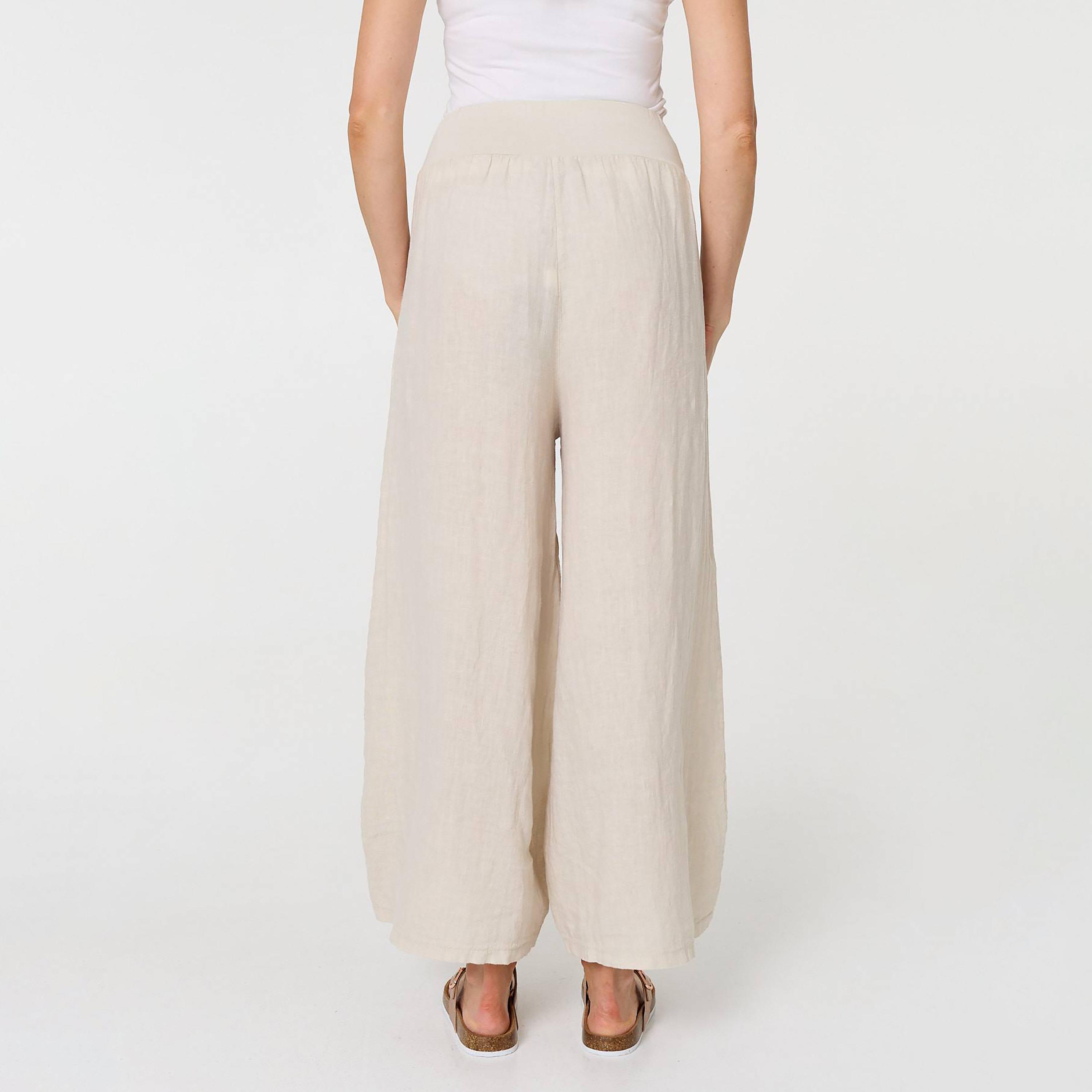 بنطلون كتان نسائي قصة "فلير" واسعة من الأسفل بلون بيج من إيزابيل لندن-women-clothing-bottoms-trousers-image-3