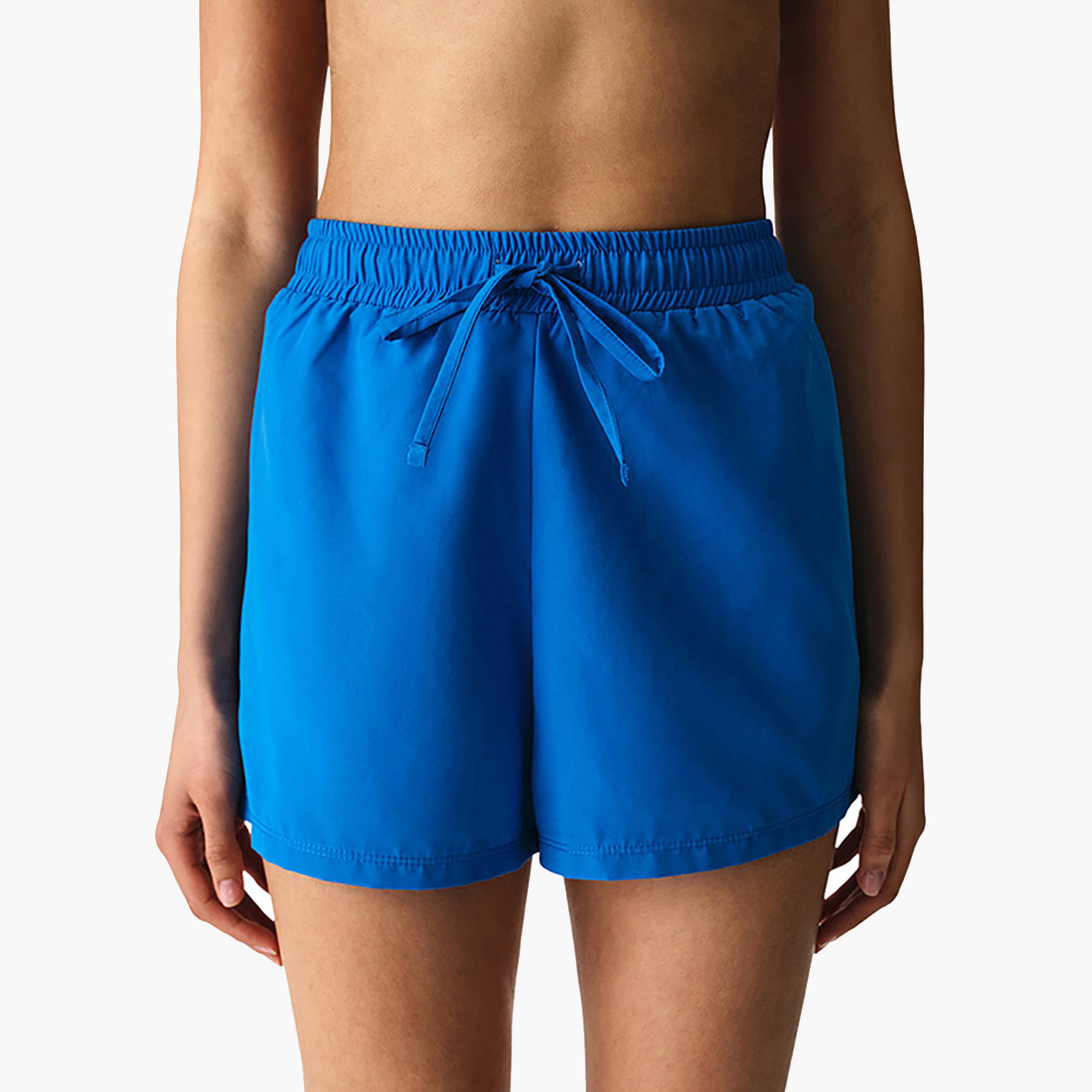 شورت سباحة سادة بخصر مرتفع ورباط تضييق للنساء من بينتي-women-clothing-swimandbeach-beachwear-image-1