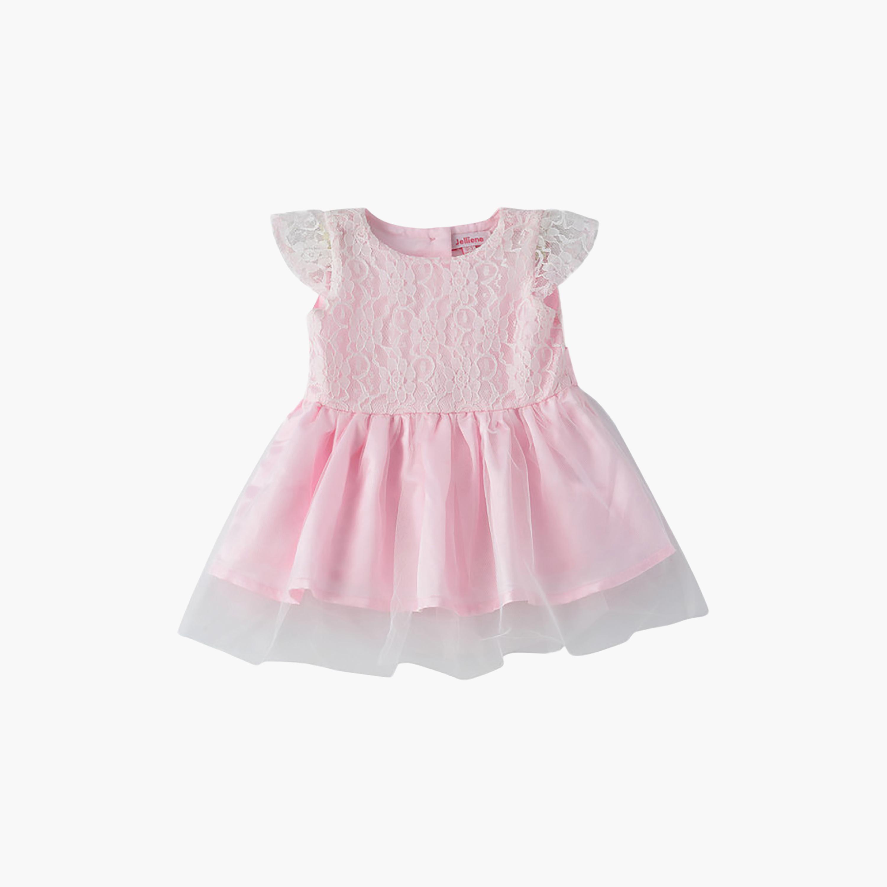 فستان قطن بأكمام قصيرة جداً (كاب) وبقوام بارز بنقشة زهور من يونيكيدز-baby-girls-clothing-dressesandjumpsuits-image-1