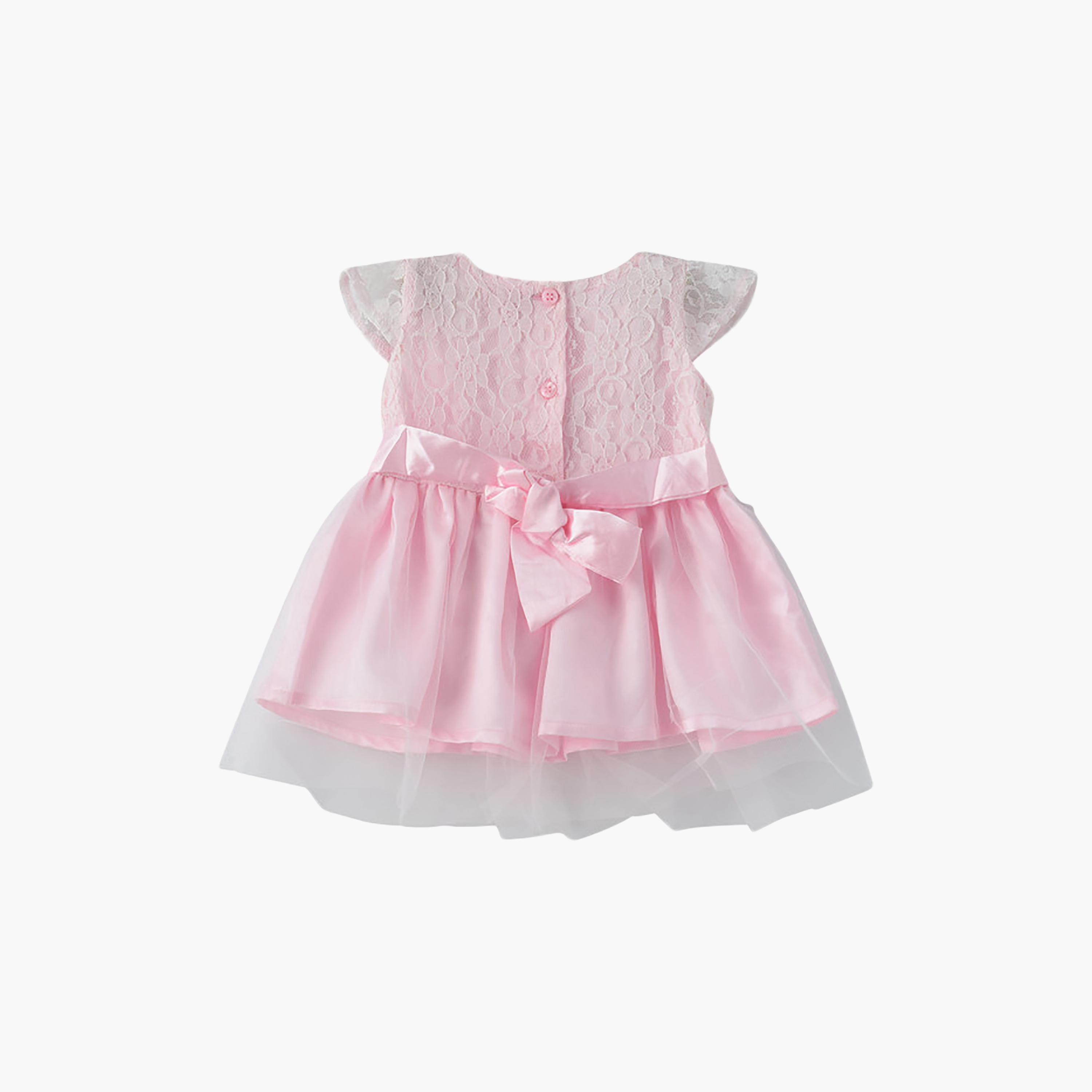 فستان قطن بأكمام قصيرة جداً (كاب) وبقوام بارز بنقشة زهور من يونيكيدز-baby-girls-clothing-dressesandjumpsuits-image-2