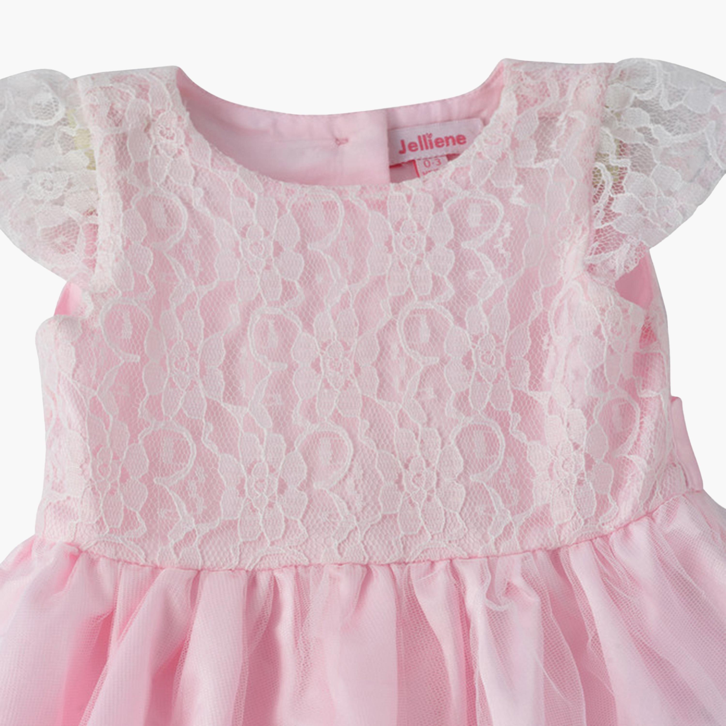 فستان قطن بأكمام قصيرة جداً (كاب) وبقوام بارز بنقشة زهور من يونيكيدز-baby-girls-clothing-dressesandjumpsuits-image-3