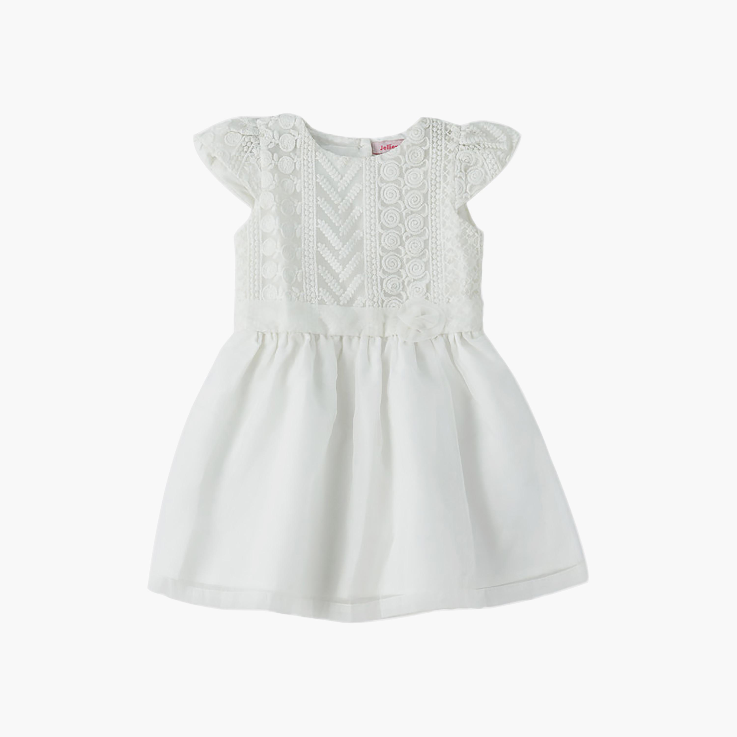 فستان قطن بقوام بارز وأكمام قصيرة جداً (كاب) من يونيكيدز-girls-clothing-dressesandjumpsuits-image-1