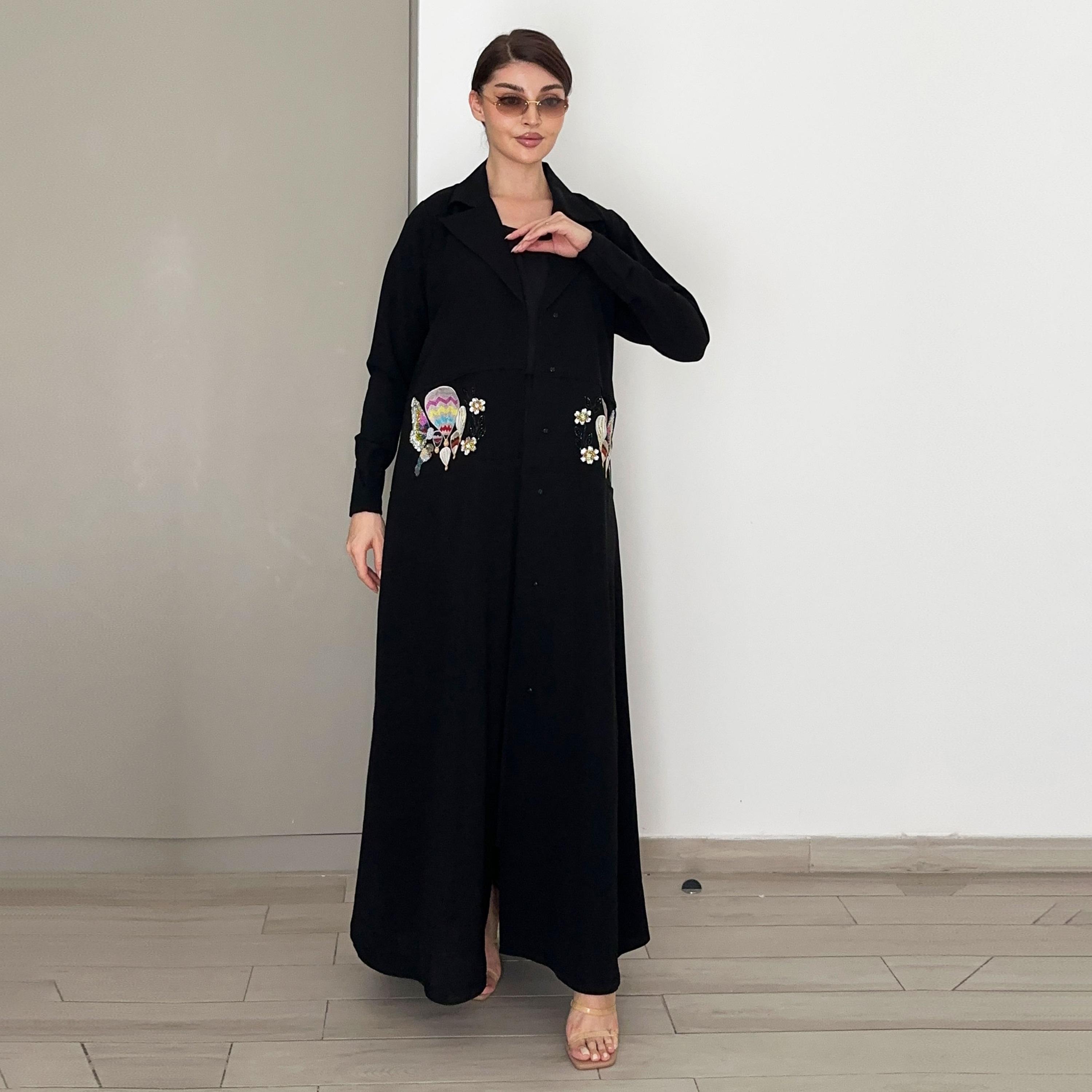 عباية بتصميم معطف كريب بياقة لا بيل مطرزة وبالخرز الأسود من روزيت عباية-women-arabicclothing-abayas-image-1