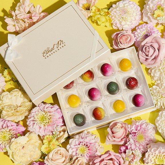 Cream 12 piece Custom Chocolate Box with Fruit Fusion truffles on yellow flower background