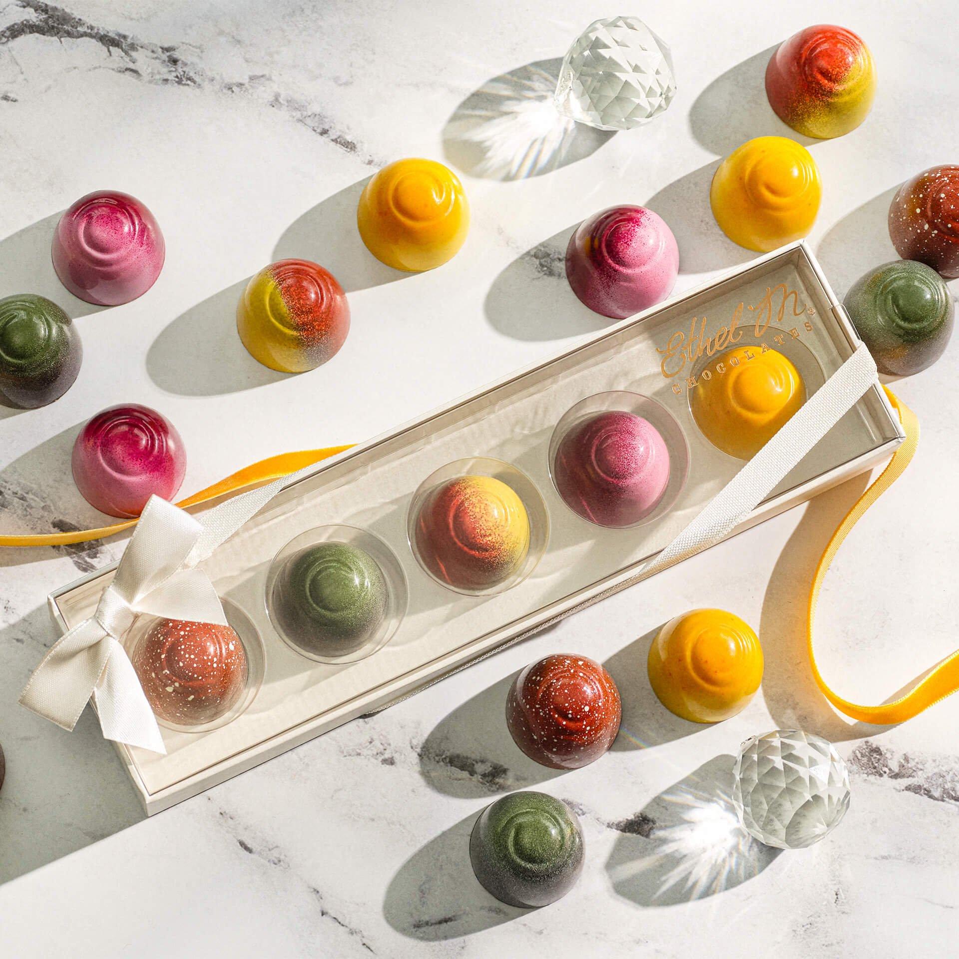 Fruit Fusion Sampler with scattered chocolate gems