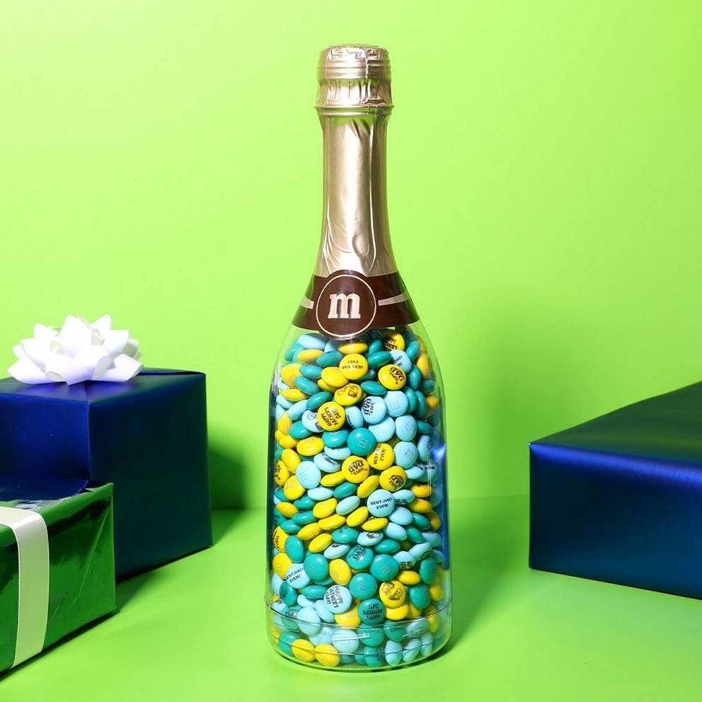 gift bottle surrounded by wrapped presents