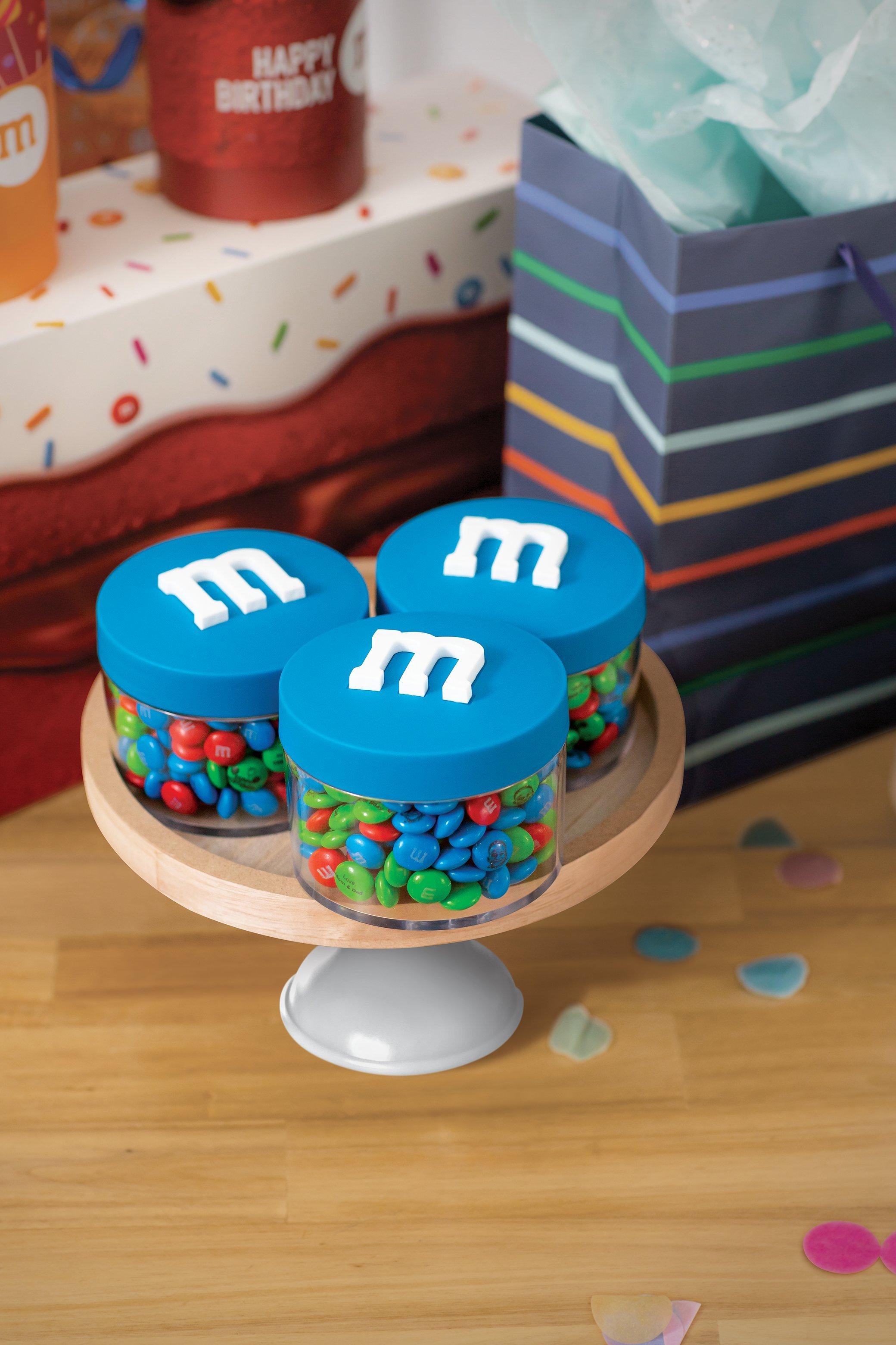 blue M&M'S containers on display filled with personalized M&M'S