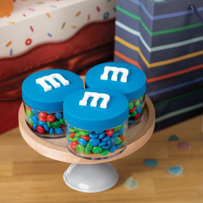 blue M&M'S containers on display filled with personalized M&M'S
