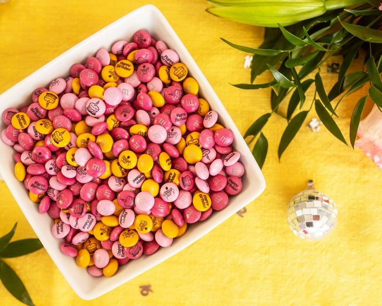 Mini occasion bottles and other treats on a table