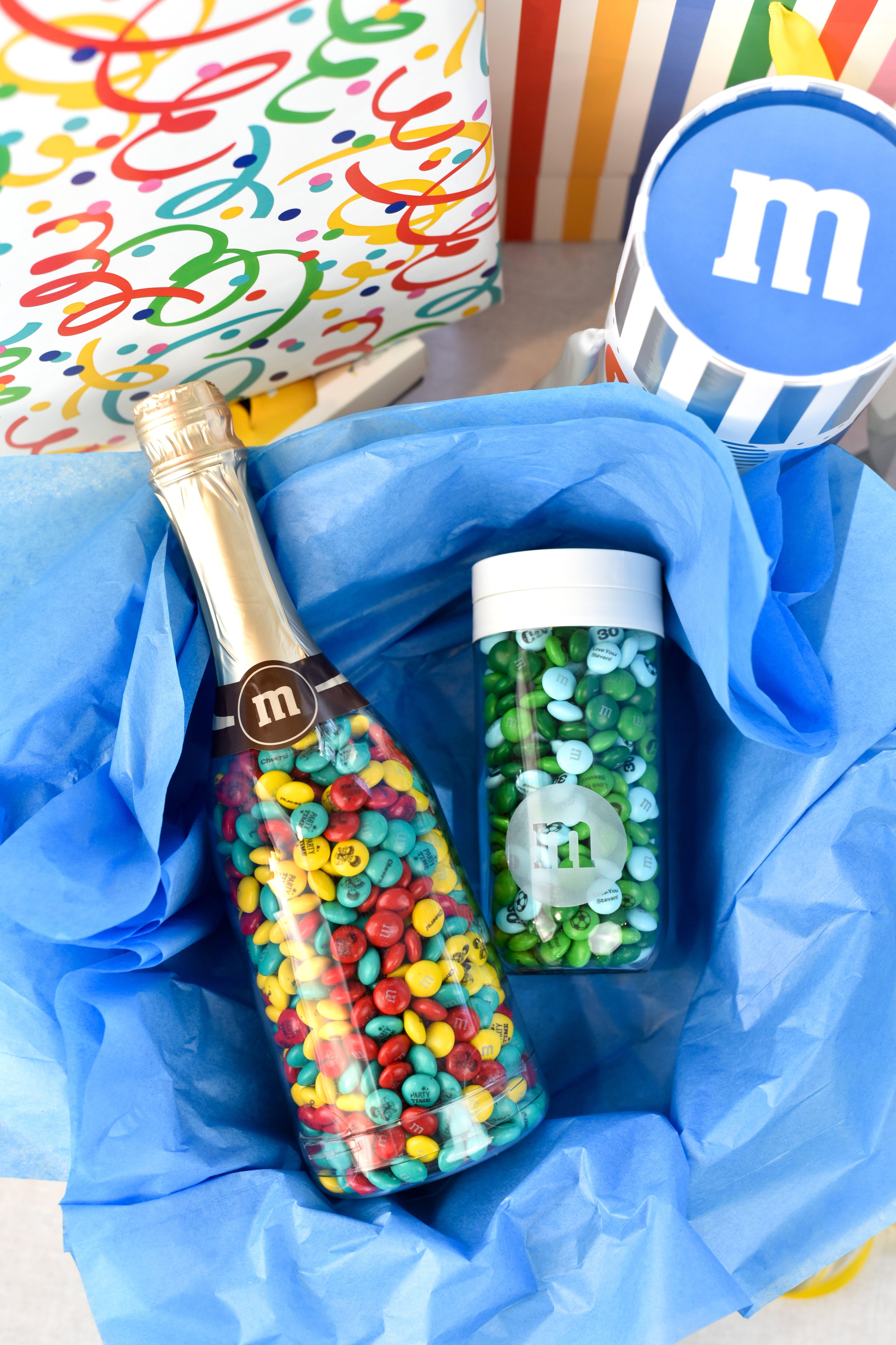 occasion bottle and gift jar surrounded by birthday presents