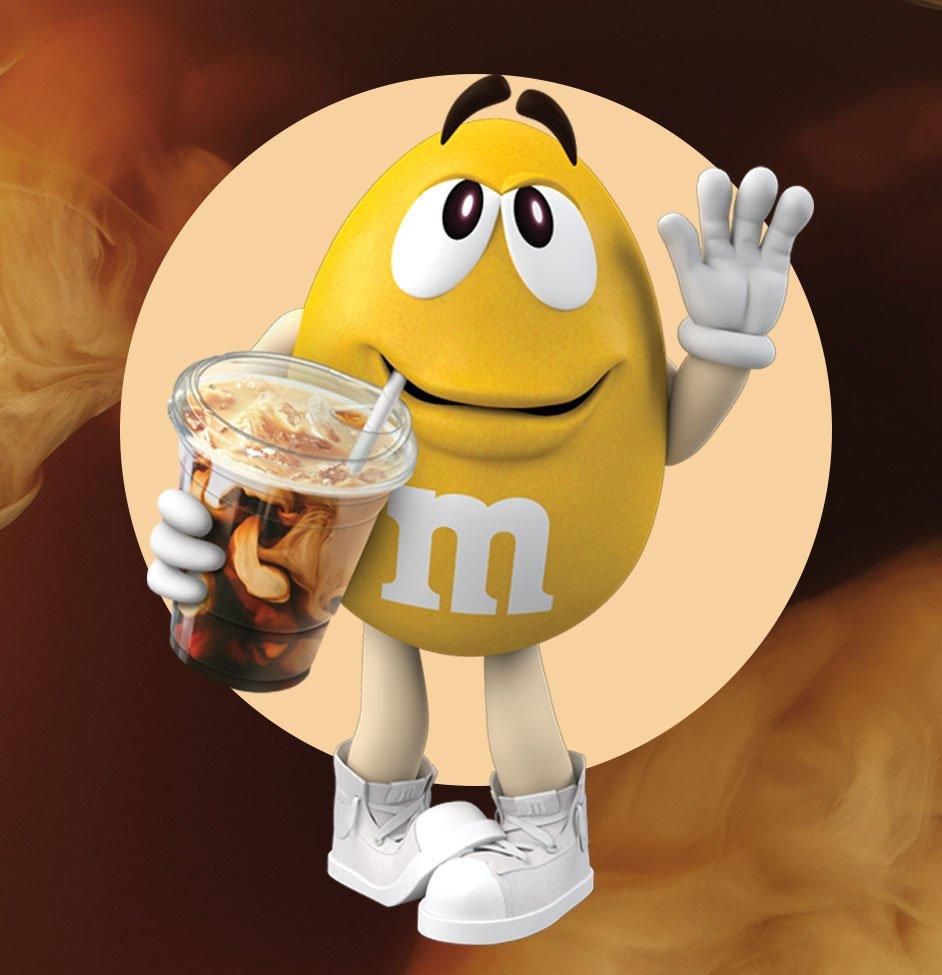 Yellow M&M'S Character holding Iced Coffee