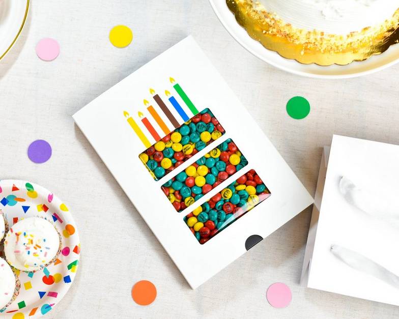 personalised gift box filled with purple, yellow and white M&M’S