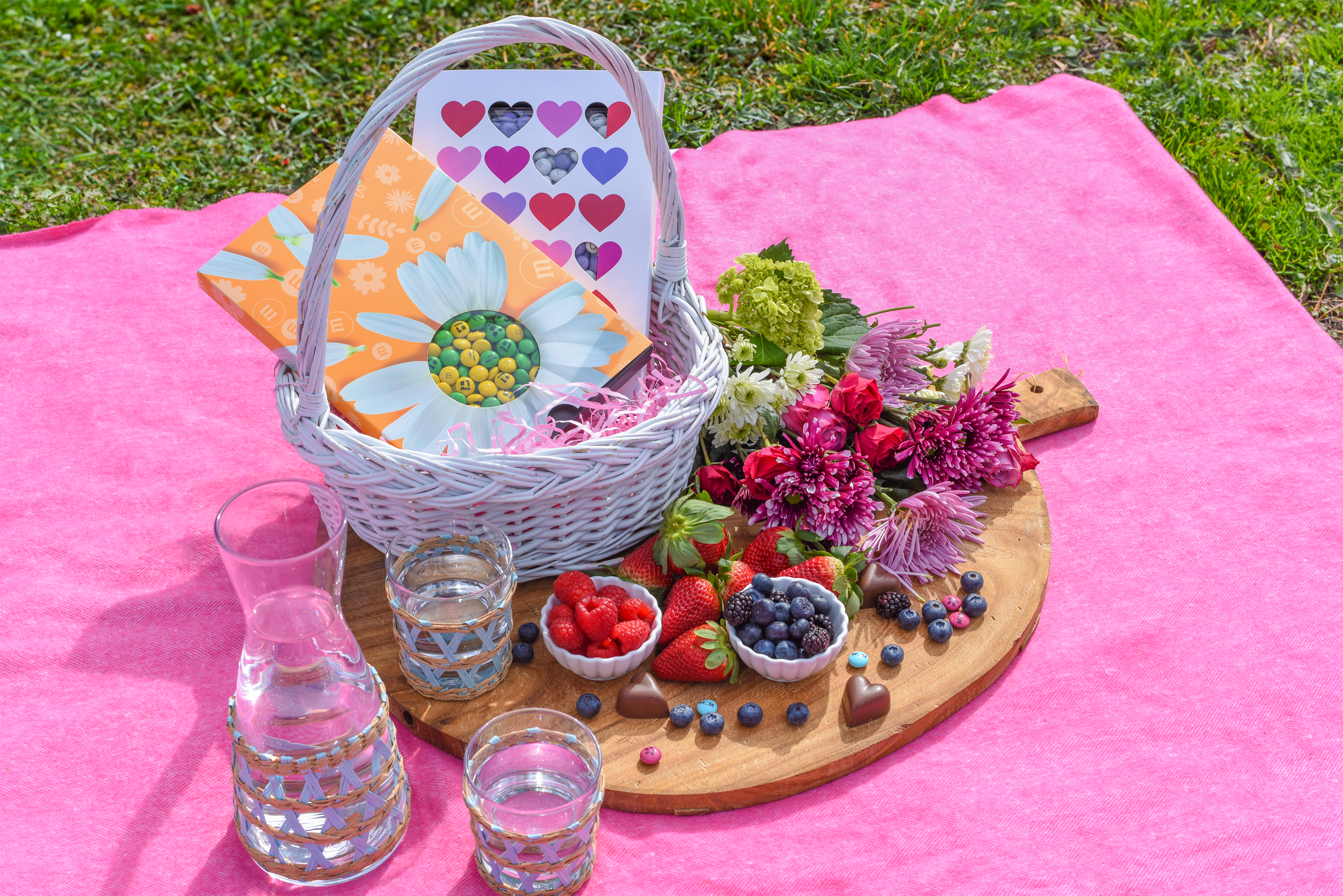 picnic basket filled with M&M'S gift boxes