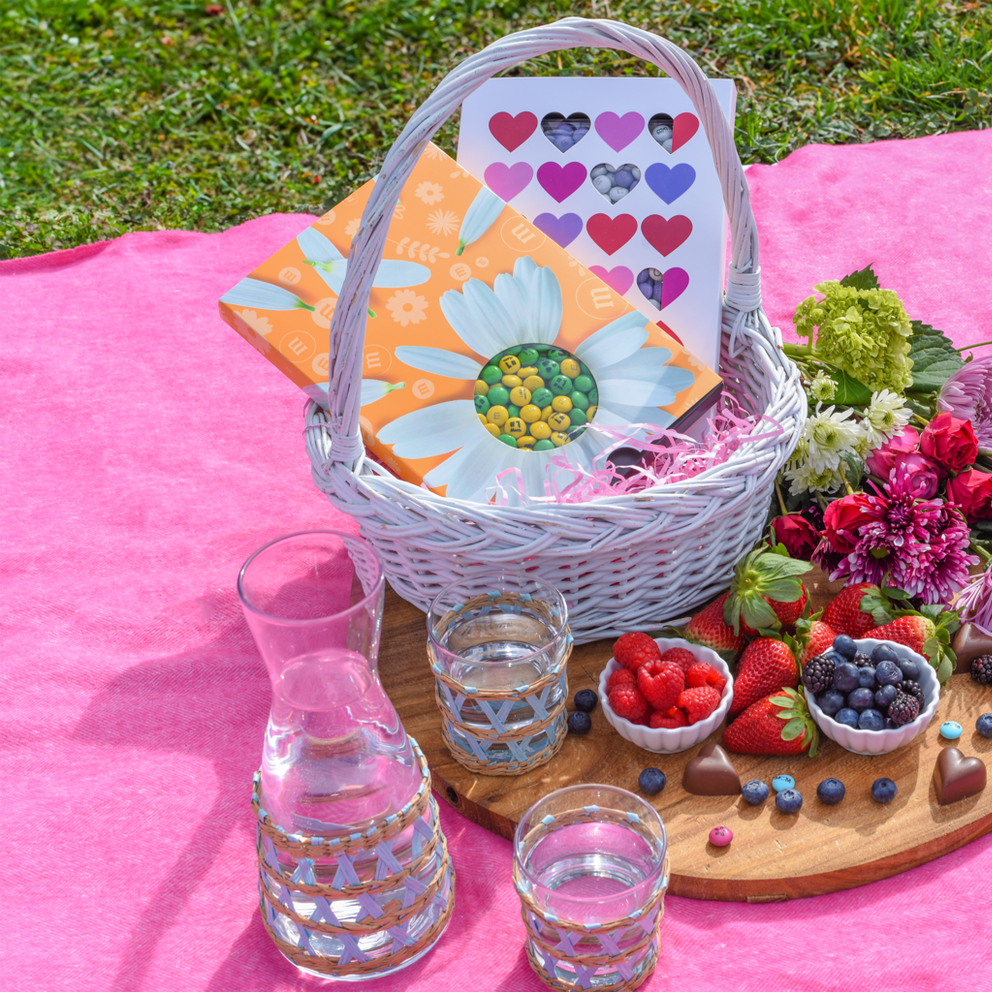 picnic basket filled with M&M'S gift boxes