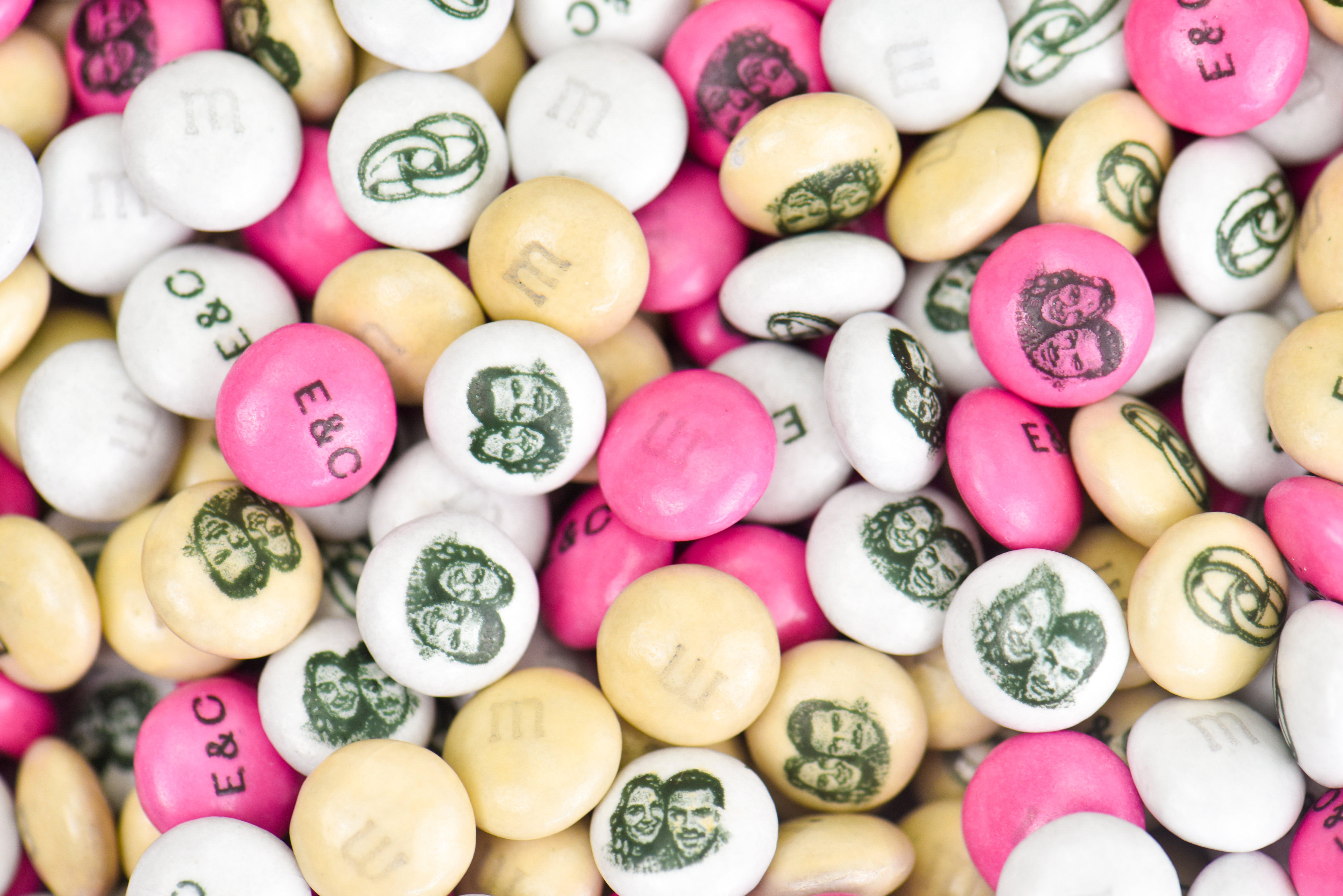 Close up of personalised white, cream, and pink M&M'S