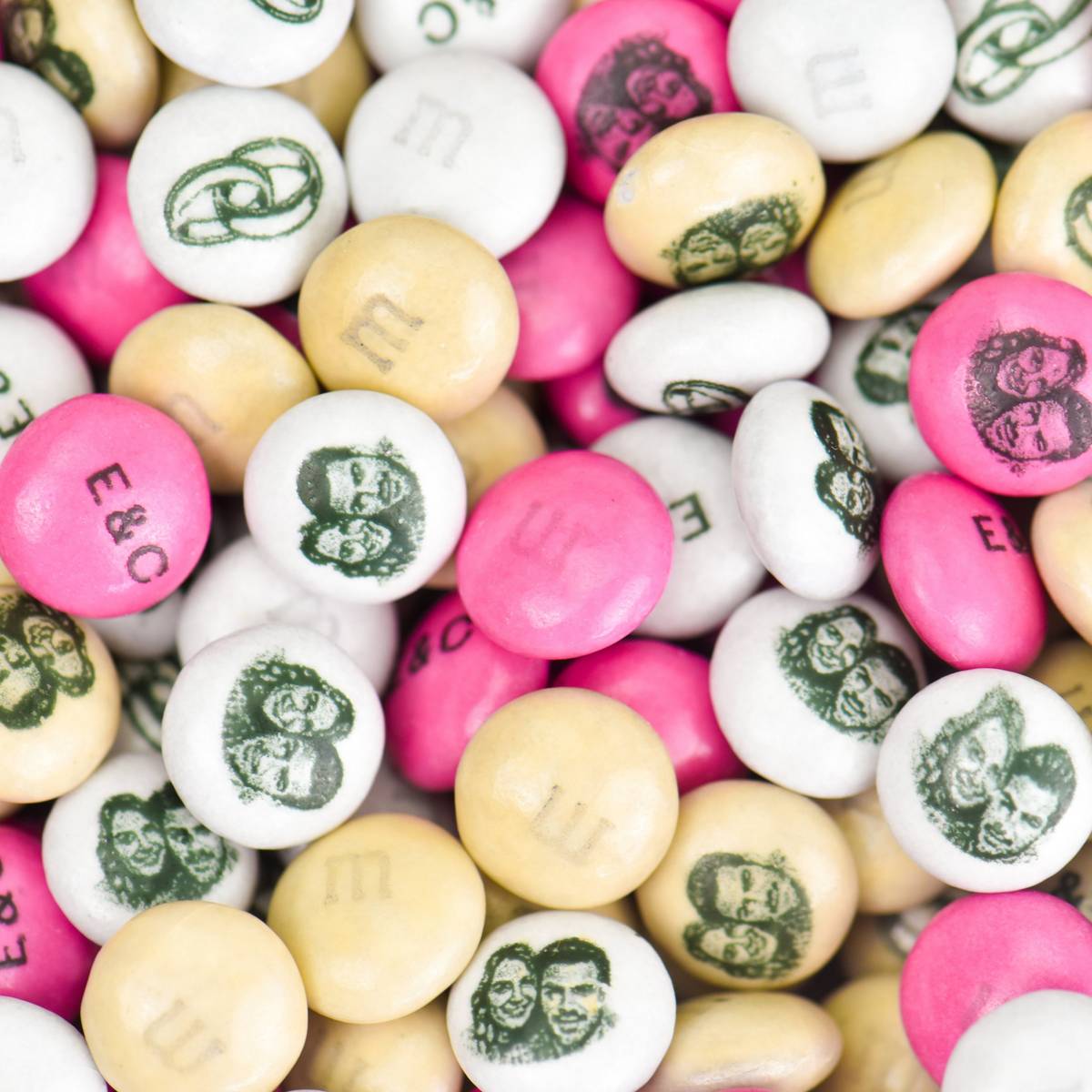 Close up of personalised white, cream, and pink M&M'S