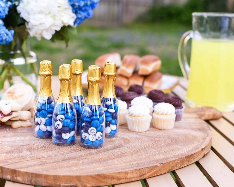 Mini occasion bottles and other treats on a table