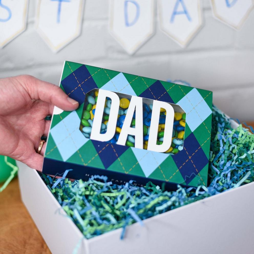 hand holding Dad gift box