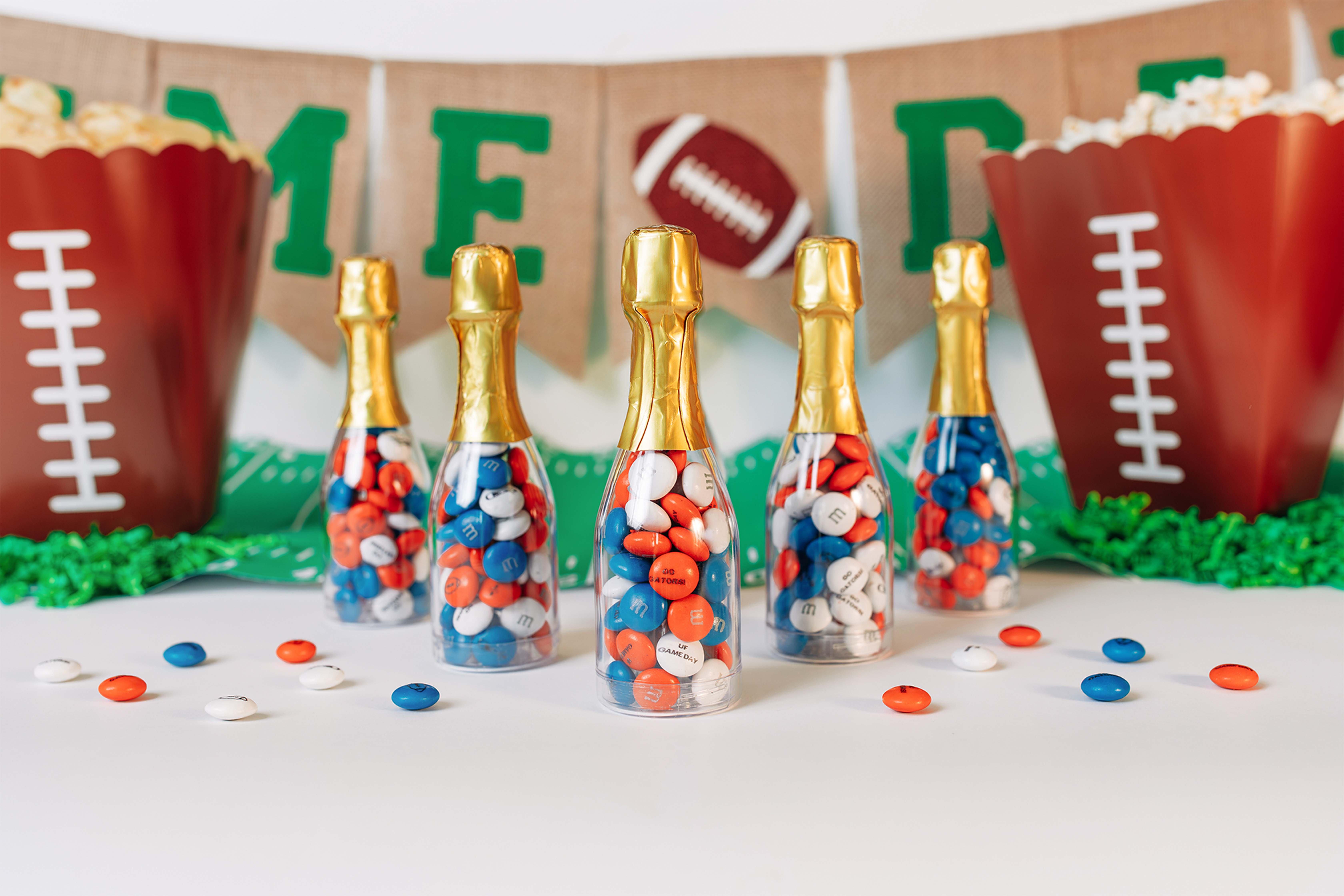 Mini occasion bottles and other treats on a table