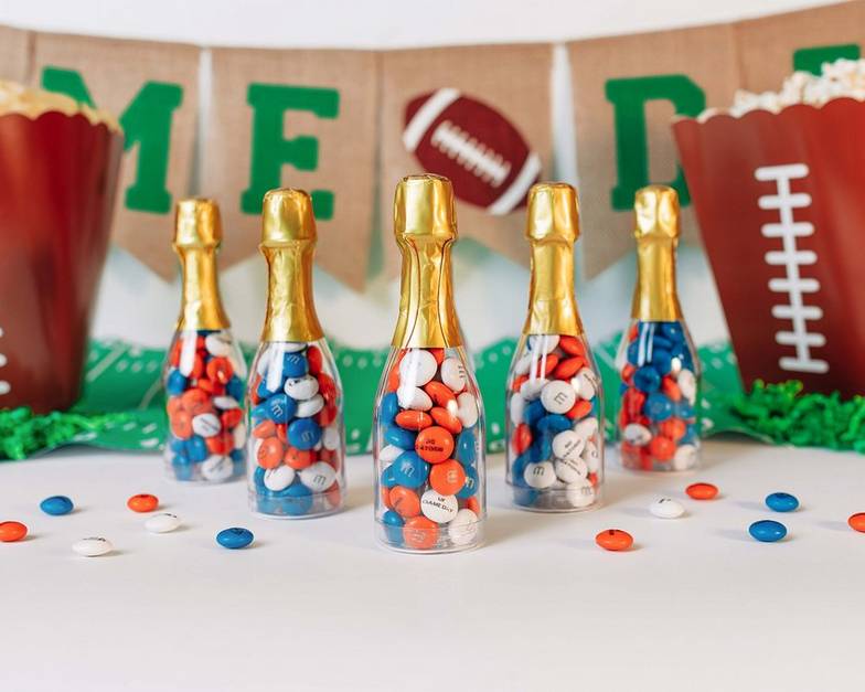 Mini occasion bottles and other treats on a table