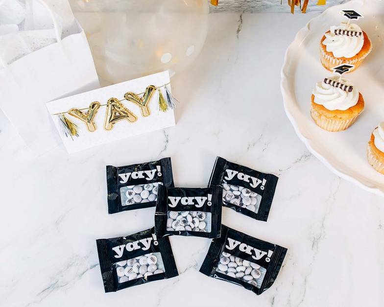 congrats grad party favors on table