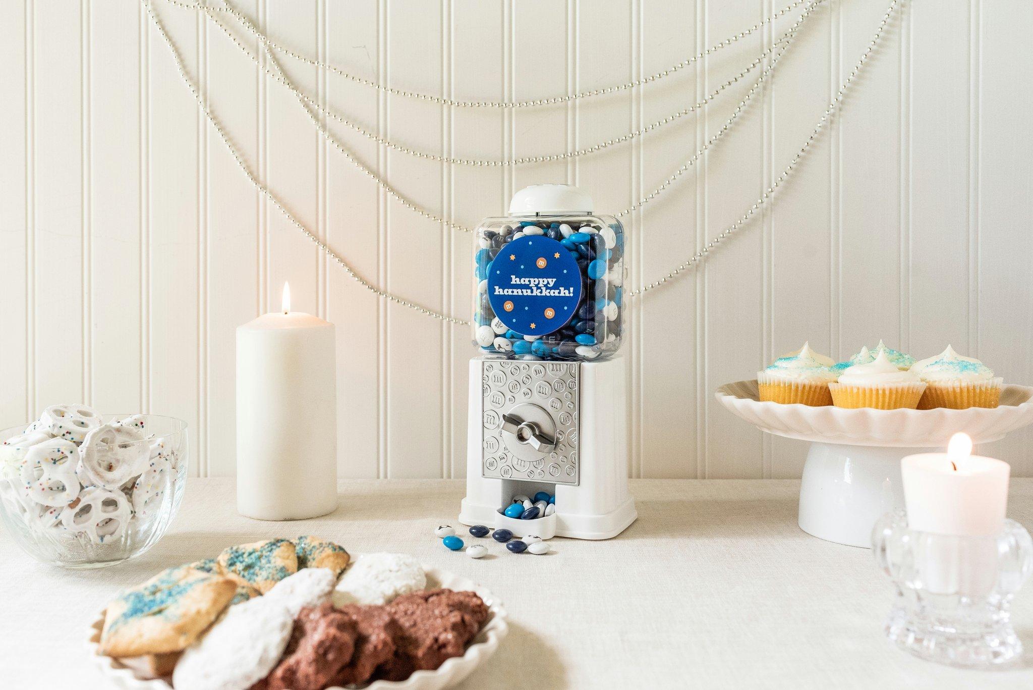 Hanukkah party display with baked goods and personalized M&M'S Happy Hanukkah Dispenser