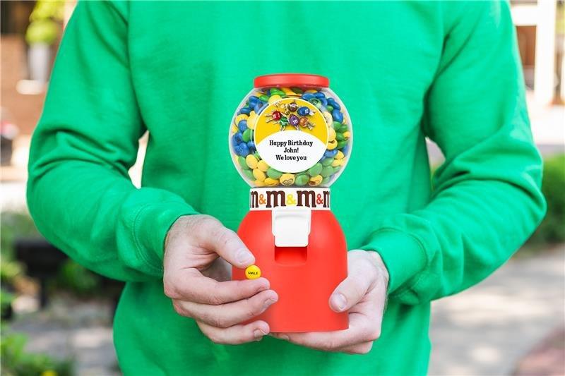 person holding personalized candy dispenser