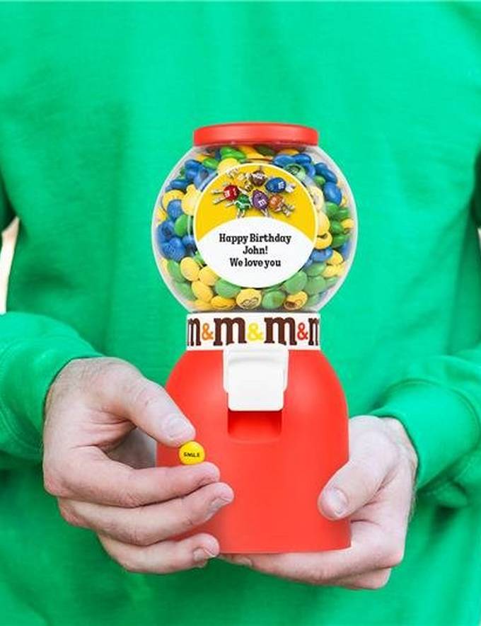 person holding personalized candy dispenser