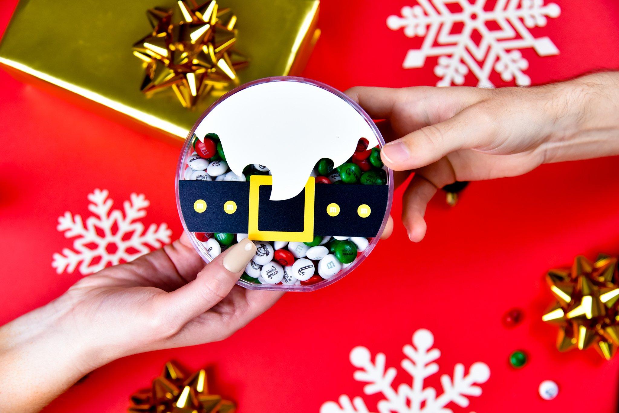 giving a Santa gift box