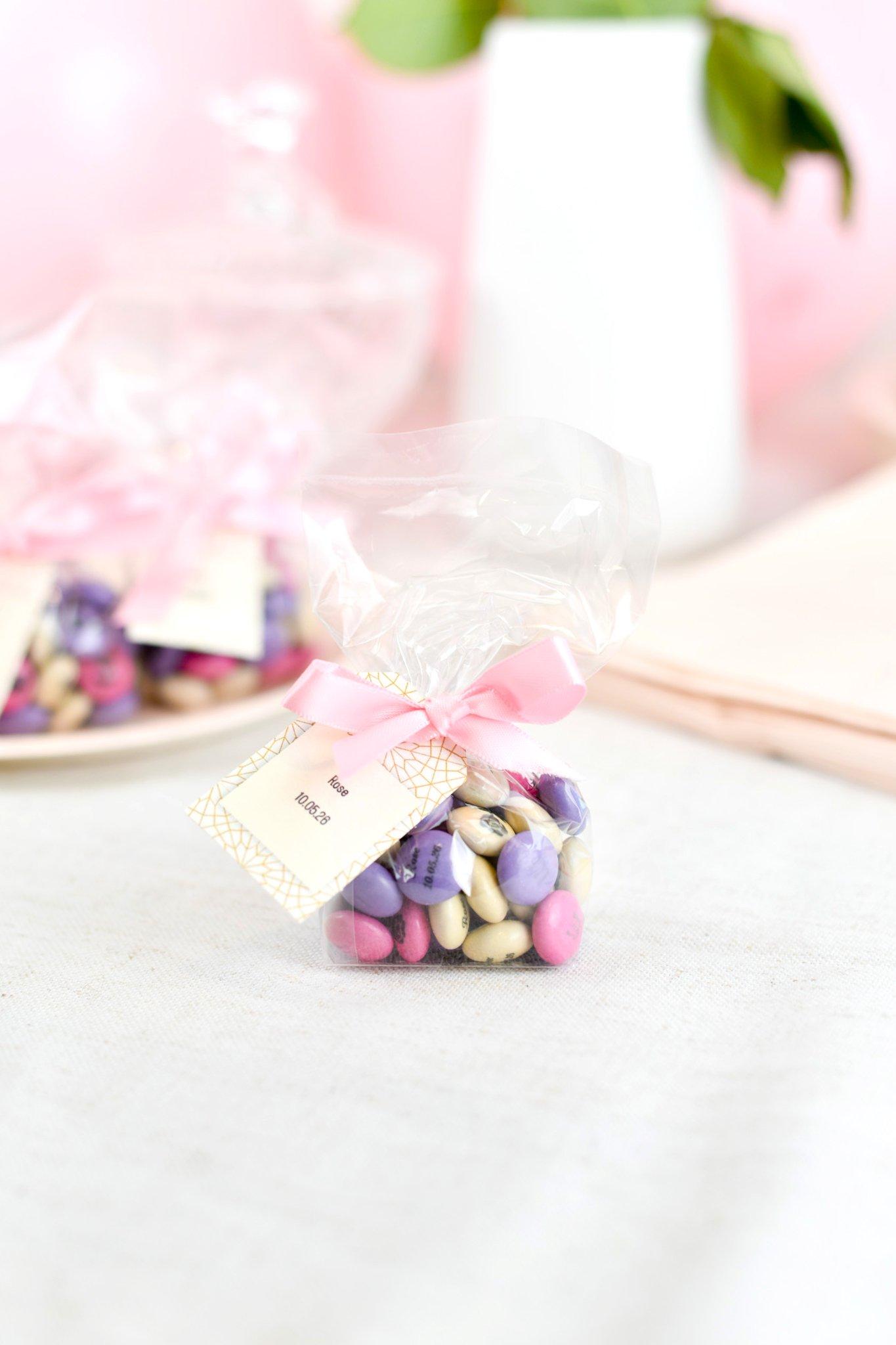 small bag with tag M&M's communion decoration