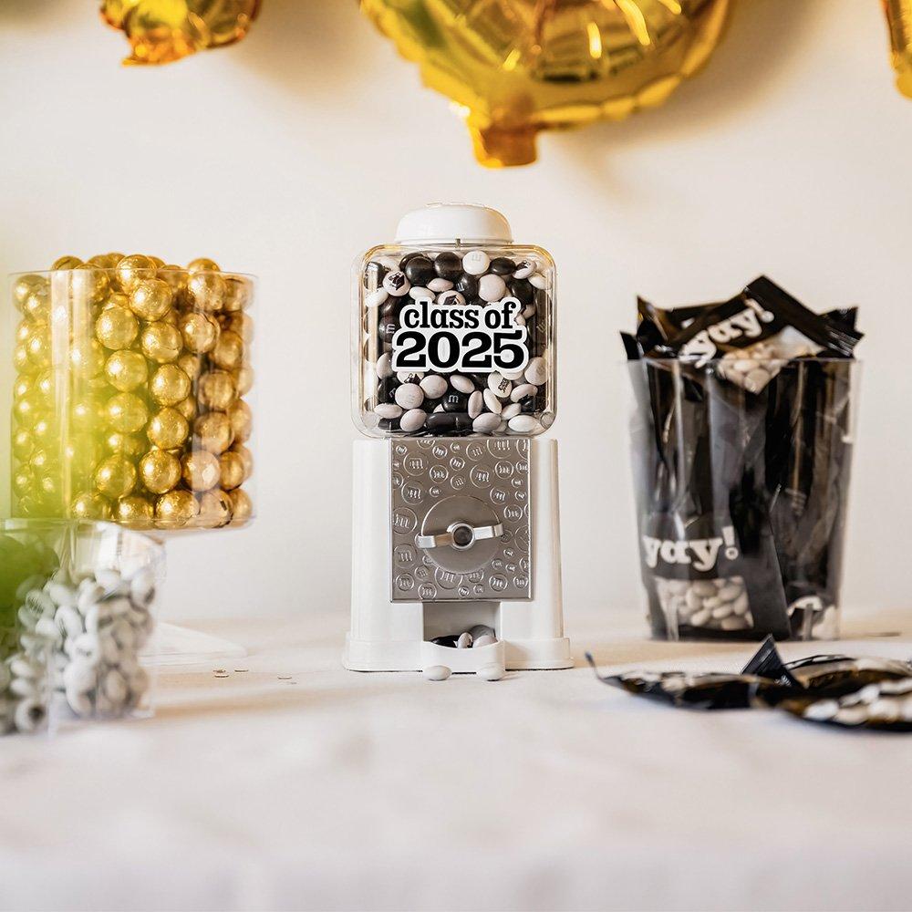 graduation gifts, party favors & desserts spread on a table