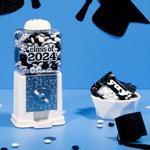 Class of 2024 dispenser and grad favor packs on table