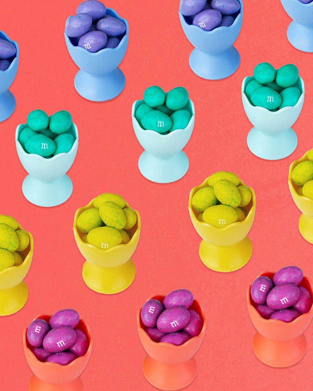 colorful peanut m&m's candy in little containers