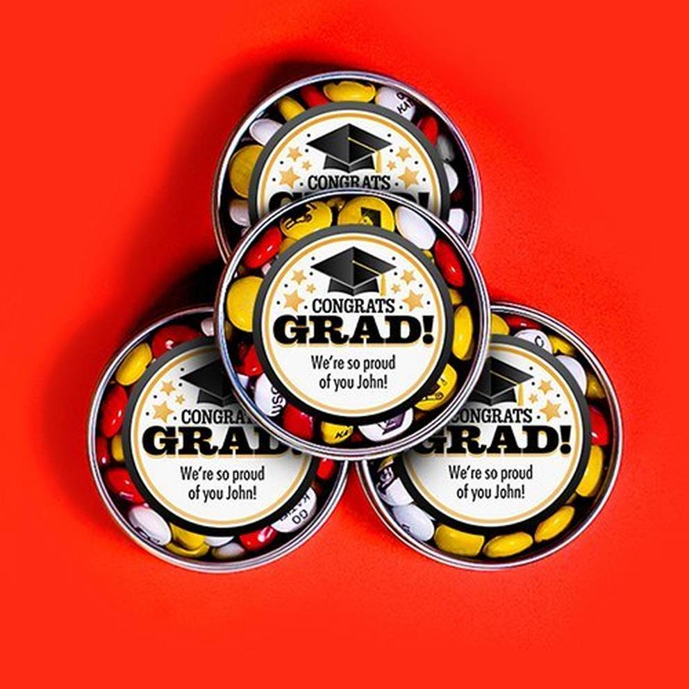 stack of graduation favor tins filled with M&M'S