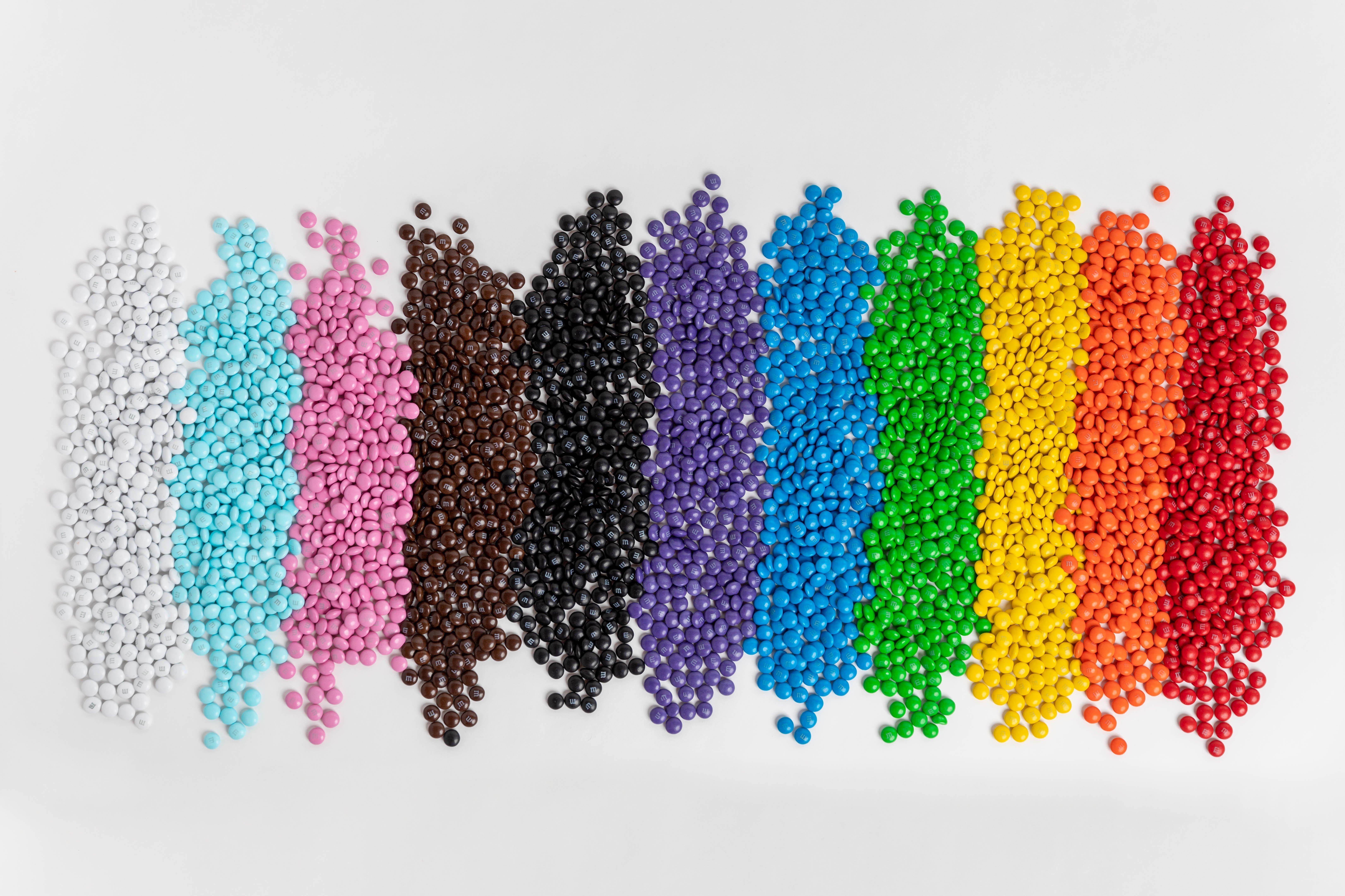 M&M'S containers in the color of the rainbow