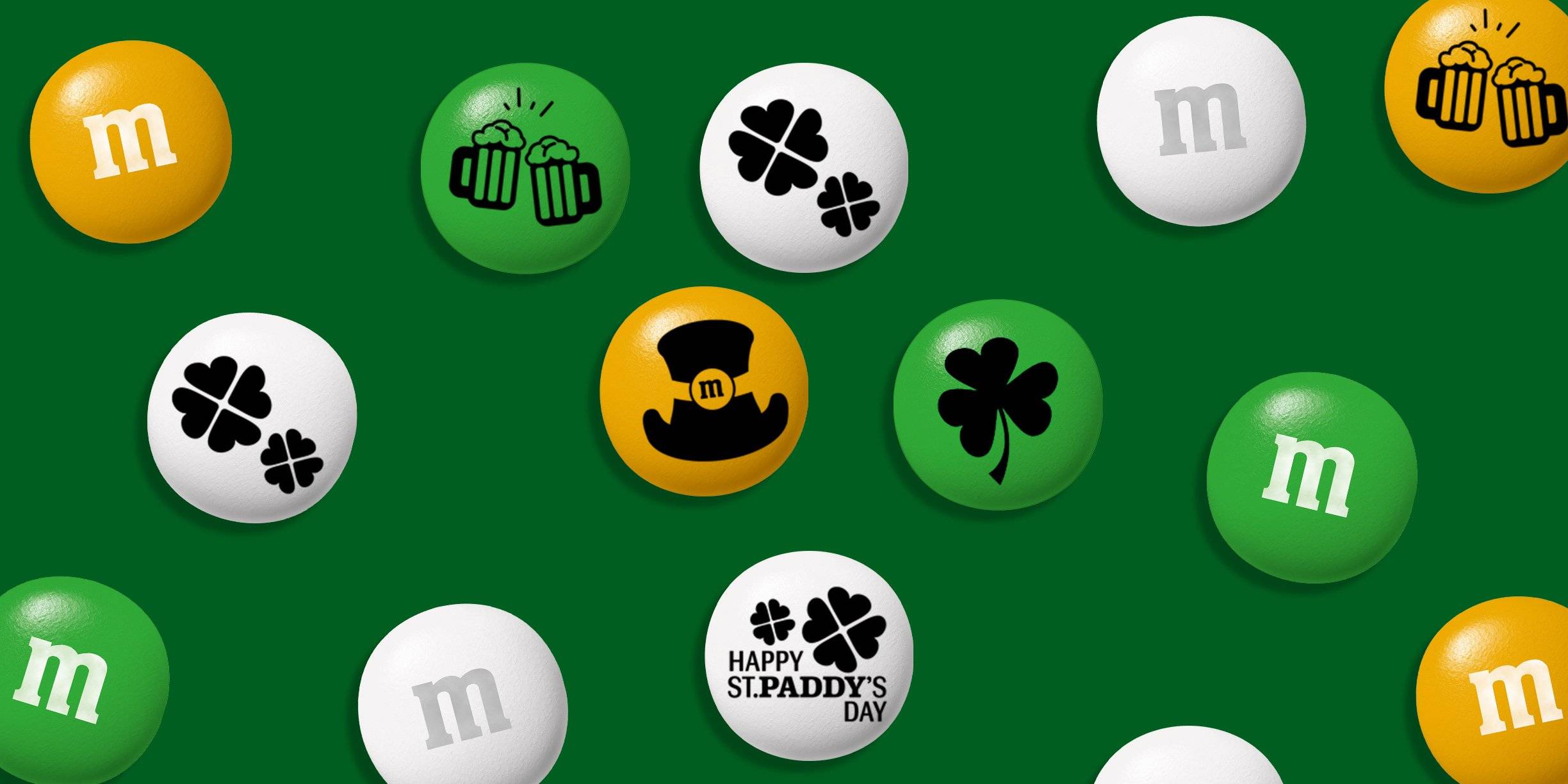 Dark green background with white, green and dark yellow M&M'S with St. Patrick's Day themed clip art