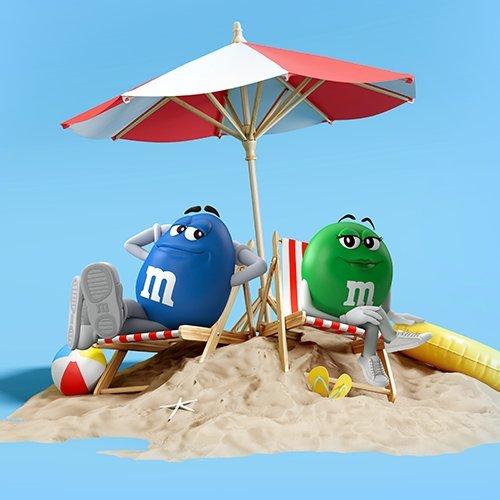 Blue and Green characters sitting on a beach