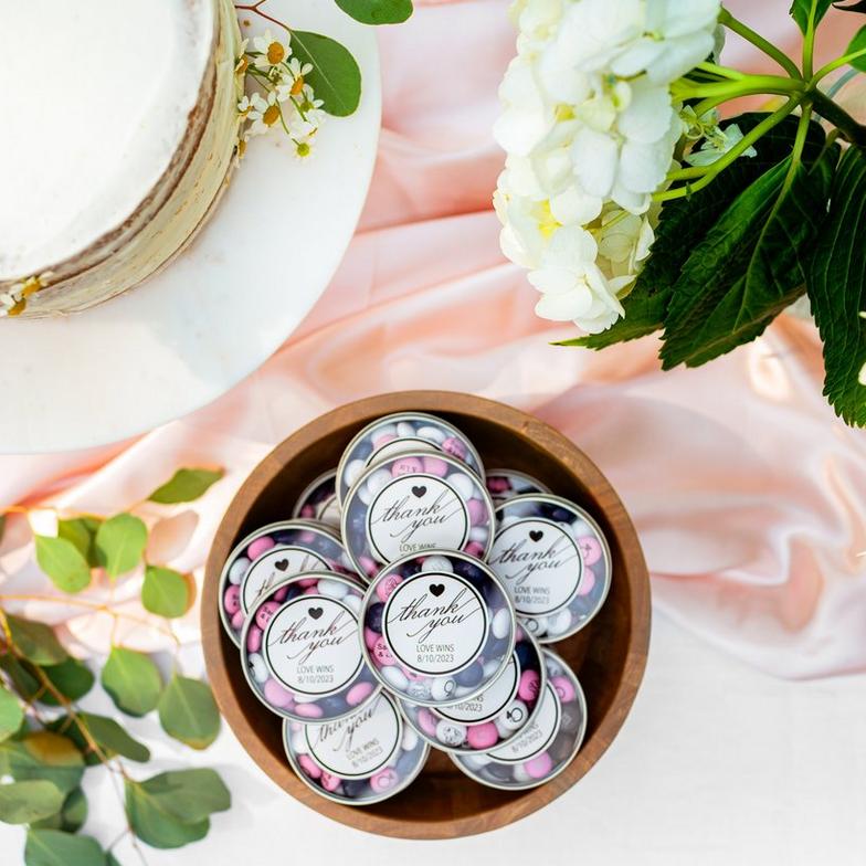 wedding favor display featuring customized M&M'S favor tins