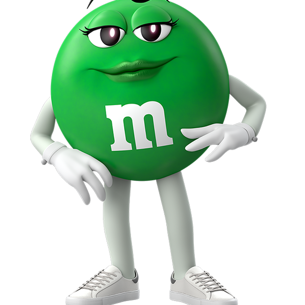 Green, de groene M&M, leunt wat met haar hand op haar heup en ziet er zelfverzekerd uit.