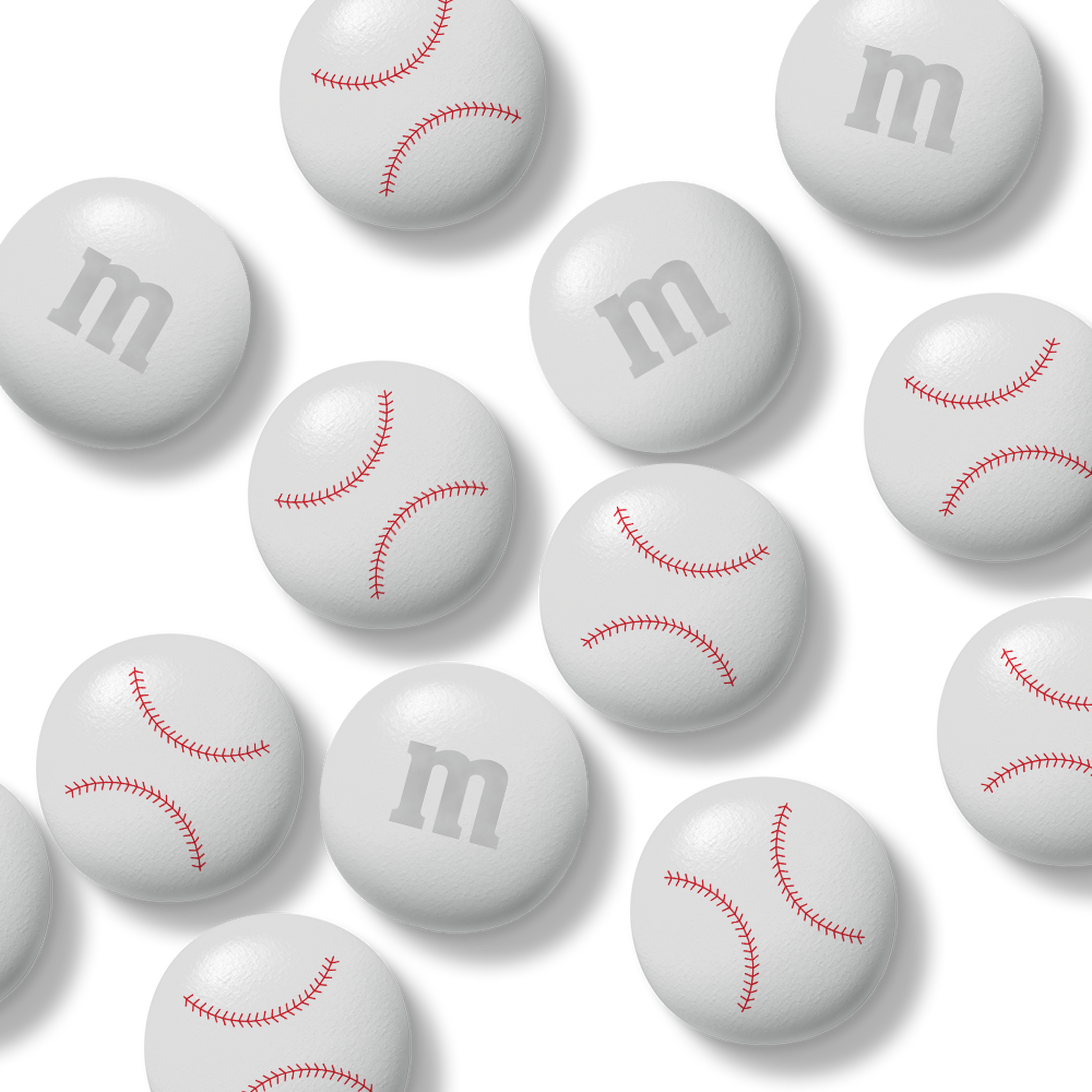 Bag of M&M'S chocolate candies, 32 oz, with Gemini zodiac symbol in packaging window, held in hand.
