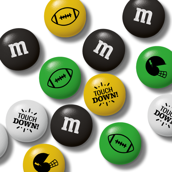 Bag of M&M'S chocolate candies, 32 oz, with a packaging window showing green, yellow, white, and black candies.