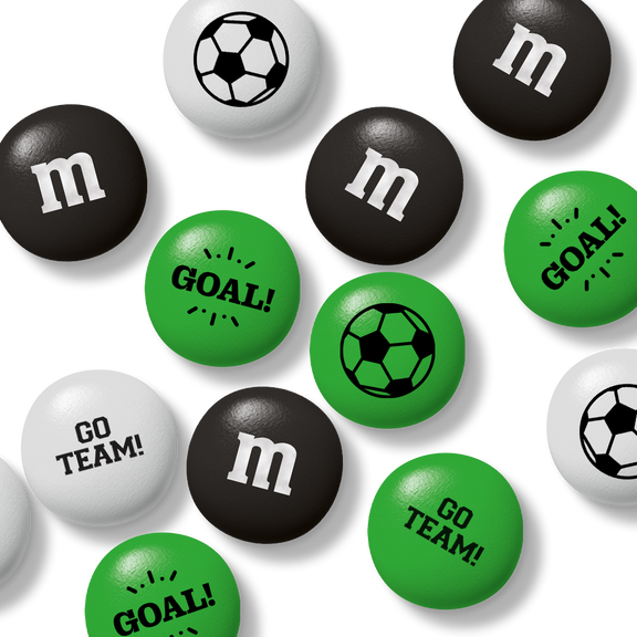 Bag of M&M'S chocolate candies, 32 oz, with packaging window showing green, white, and black candies with soccer ball designs.
