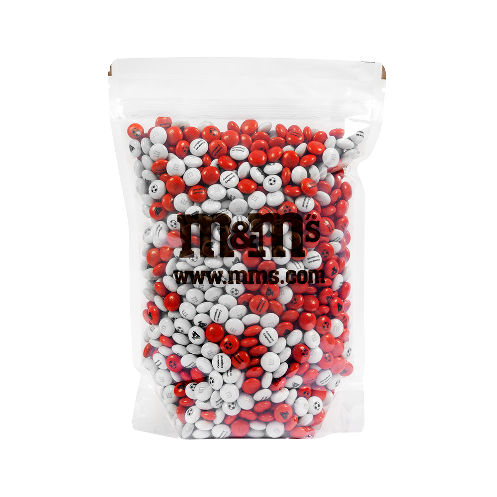 Bolsa de M&M'S de chocolate con dulces rojos y blancos, con el logo M&M'S y www.mms.com impresos en el frente.