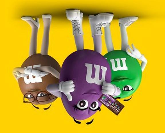 brown, purple, and green characters upside down