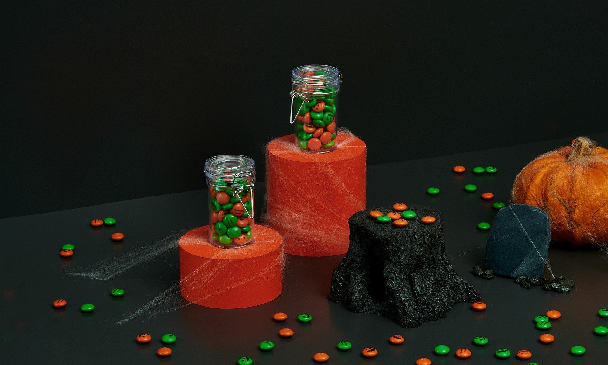 spread of Halloween gifts and favors with personalized M&M'S